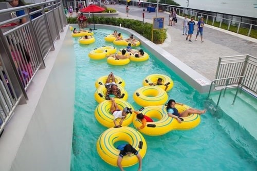 people with pool float in pool