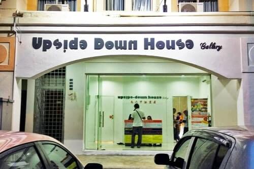 The Upside Down House to take a photo at these 8 hidden places to visit in melaka